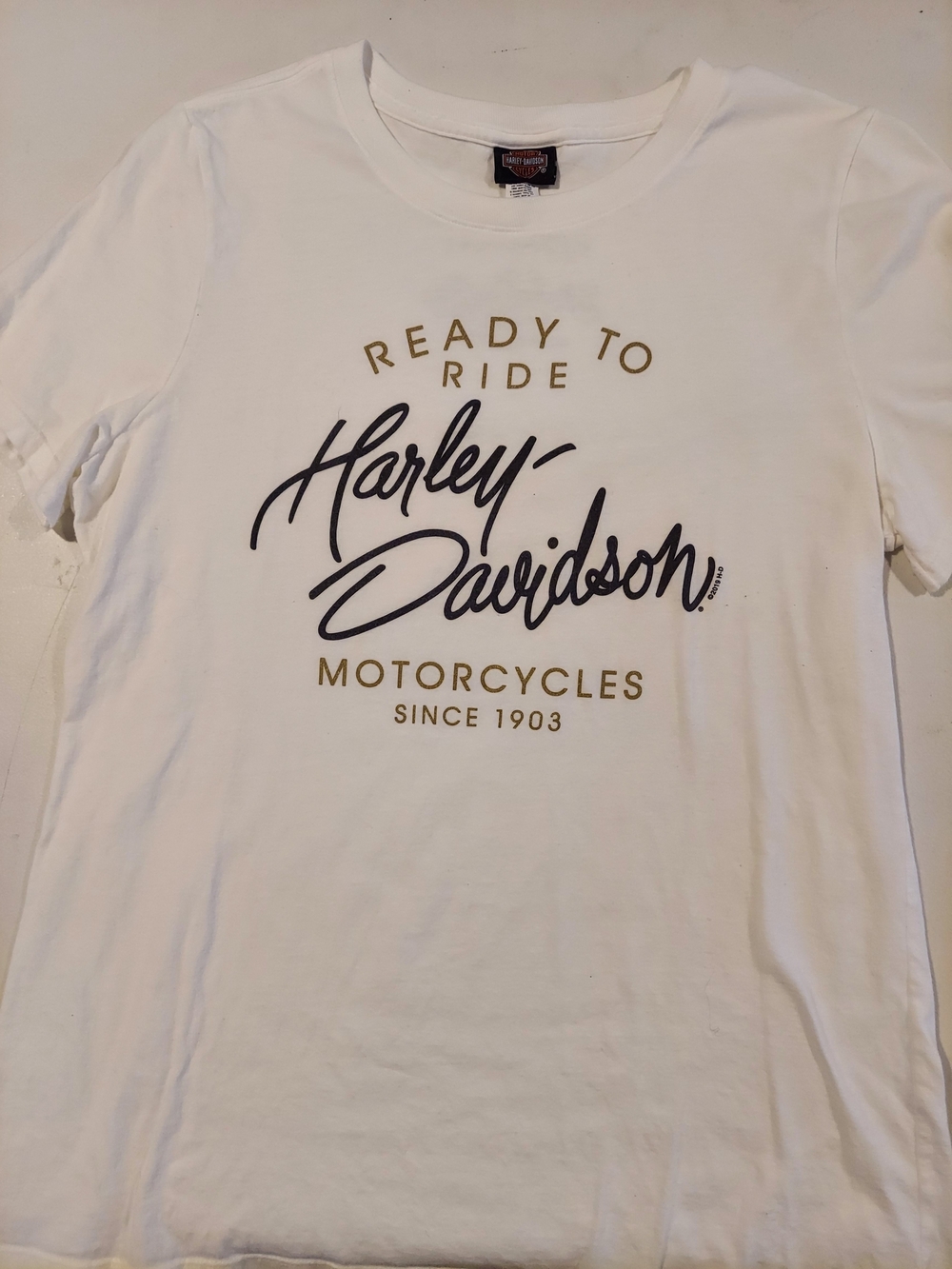 Women's Harley-Davidson White Tee with Black Script and Gold Accents